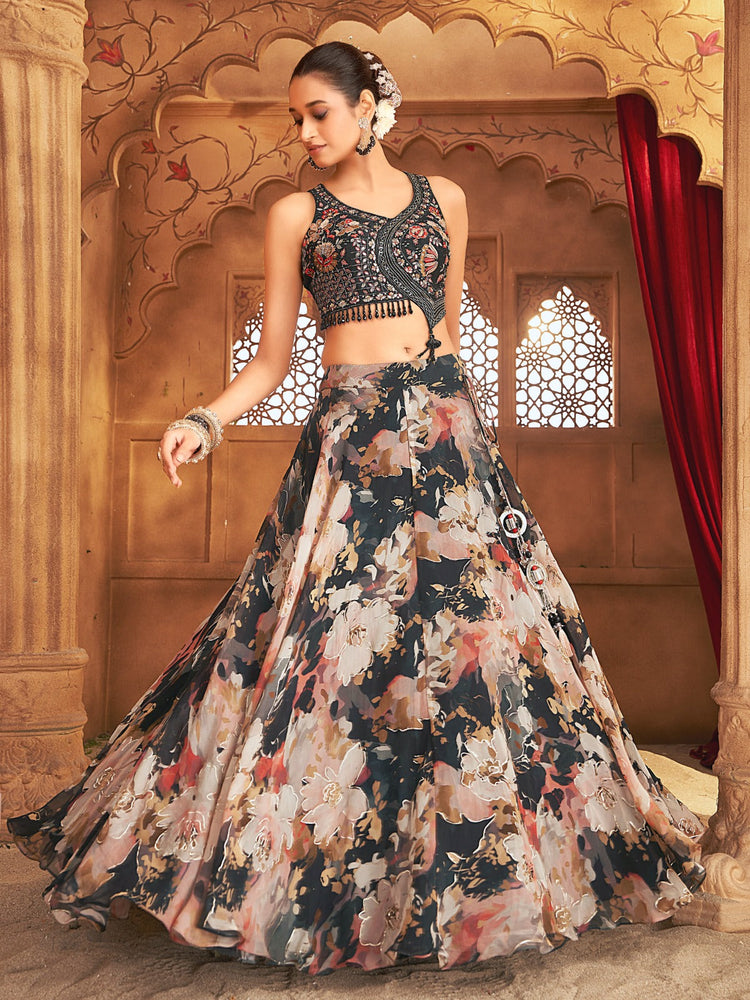 Black floral Sherni London lehenga with gold embroidery and asymmetrical blouse