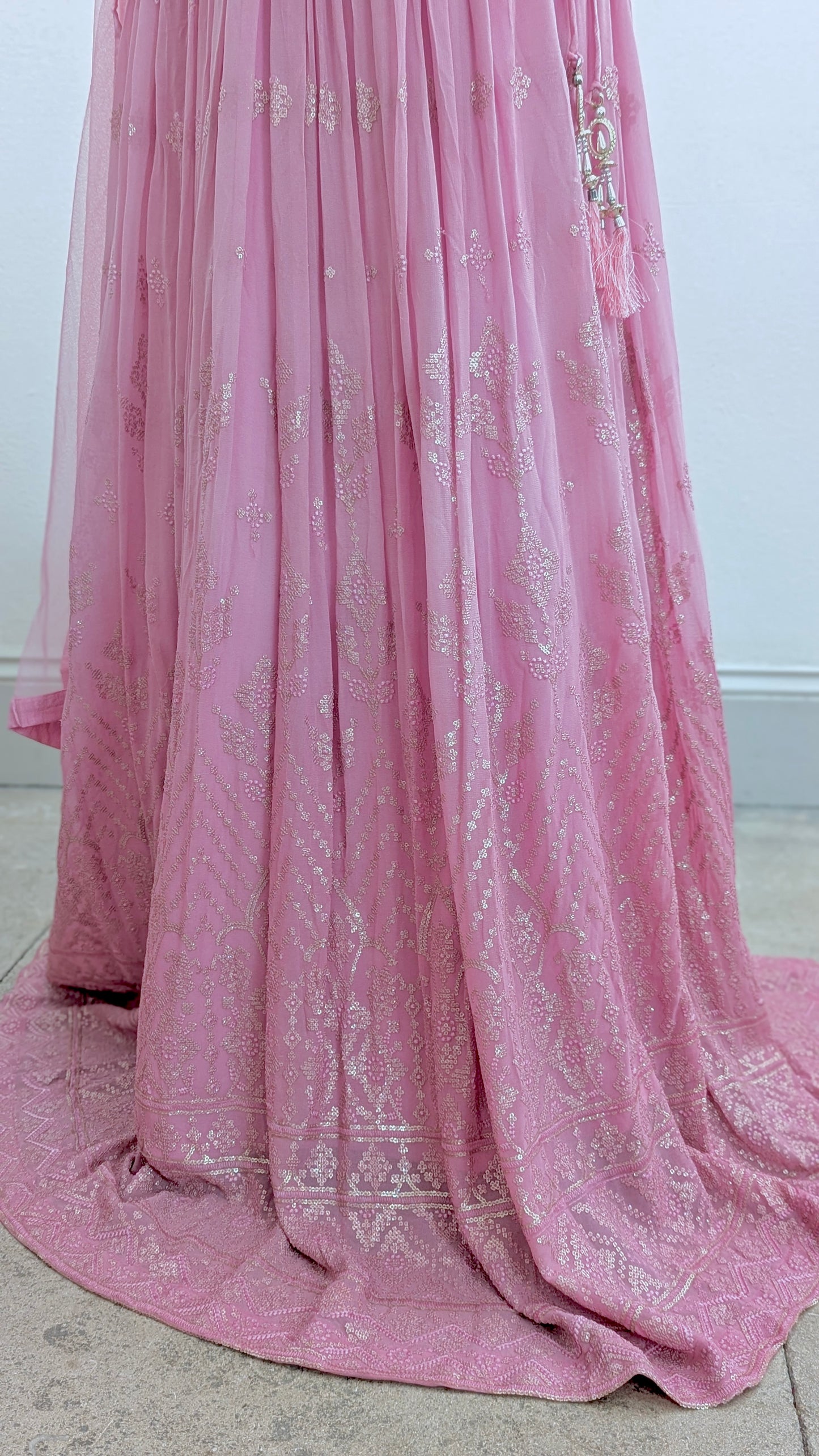 Pink ombre lehenga with delicate gold embroidery in soft georgette with a net dupatta
