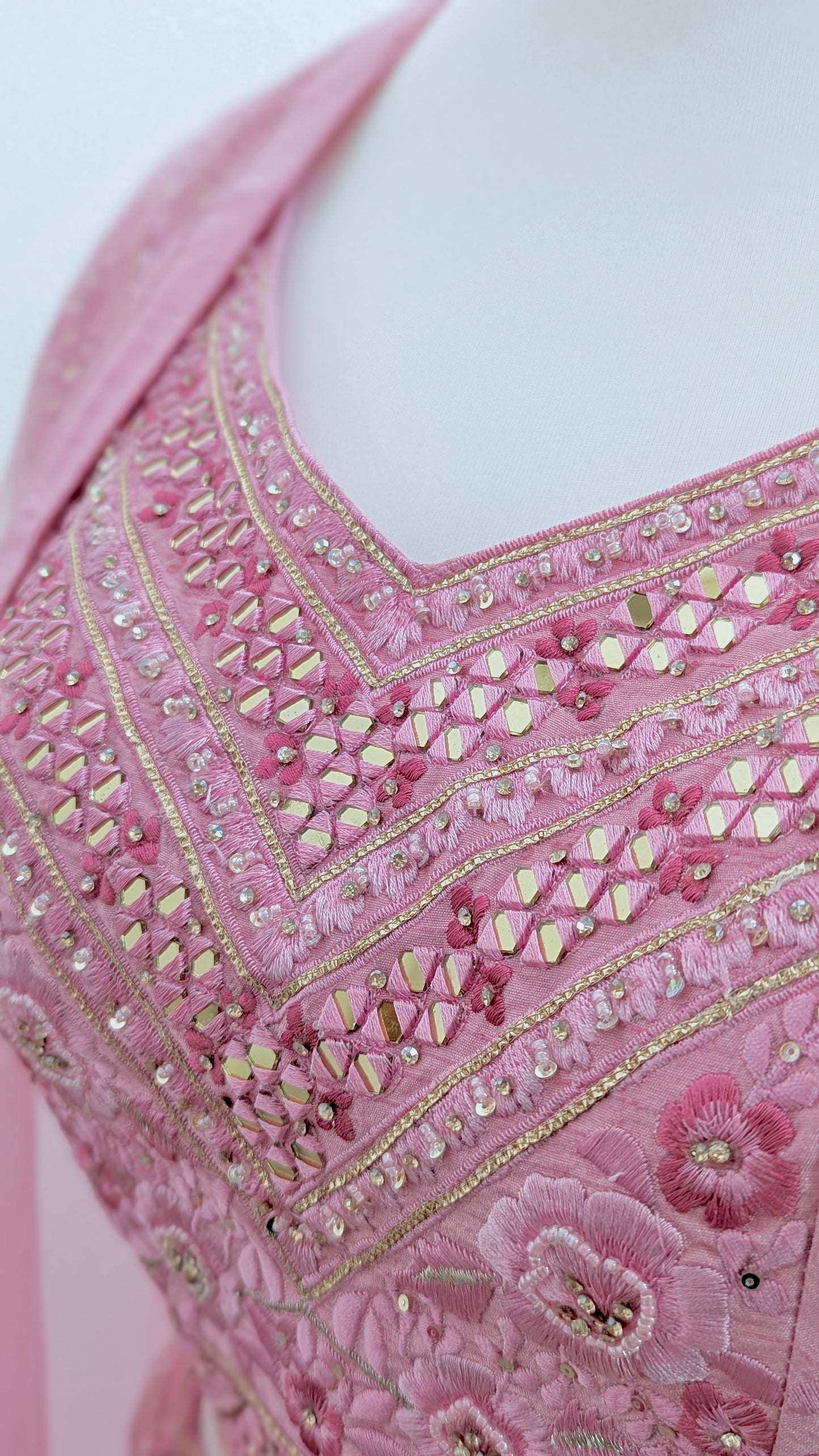 Pink ombre lehenga with delicate gold embroidery in soft georgette with a net dupatta