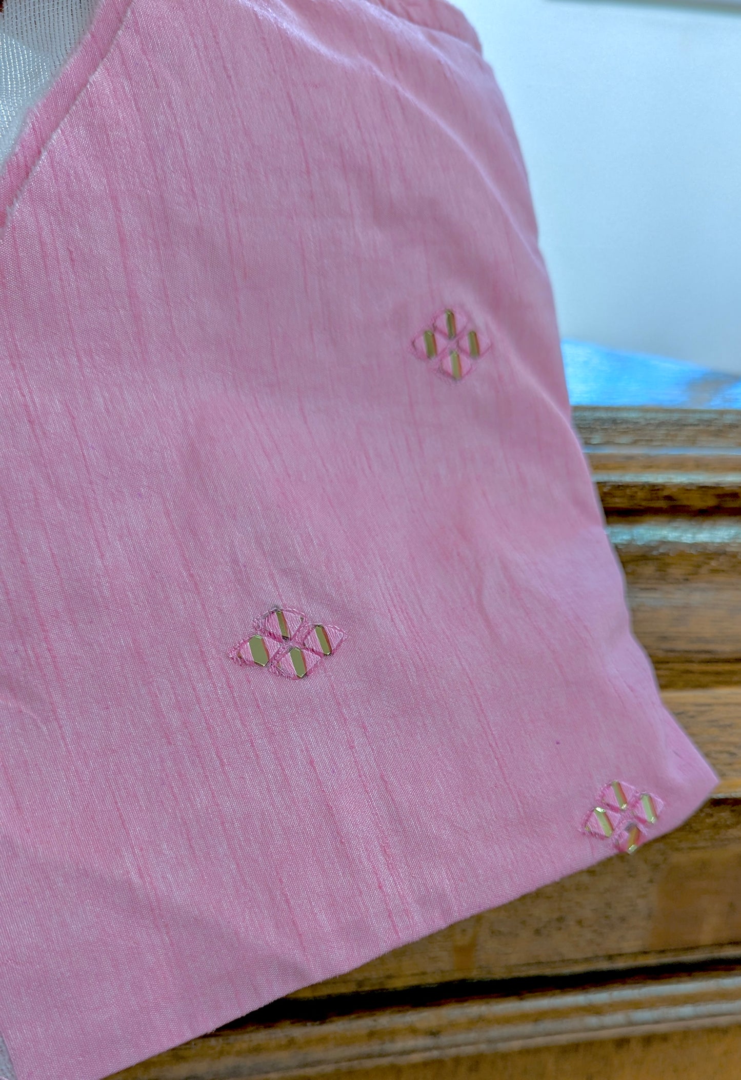 Pink ombre lehenga with delicate gold embroidery in soft georgette with a net dupatta