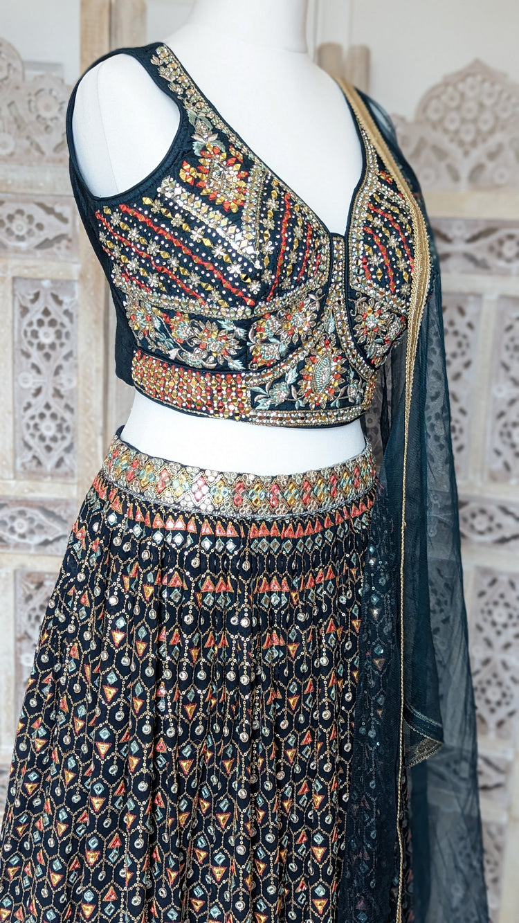 Sherni London Teal Lehenga georgette with net dupatta and heavy multi coloured embroidery all over