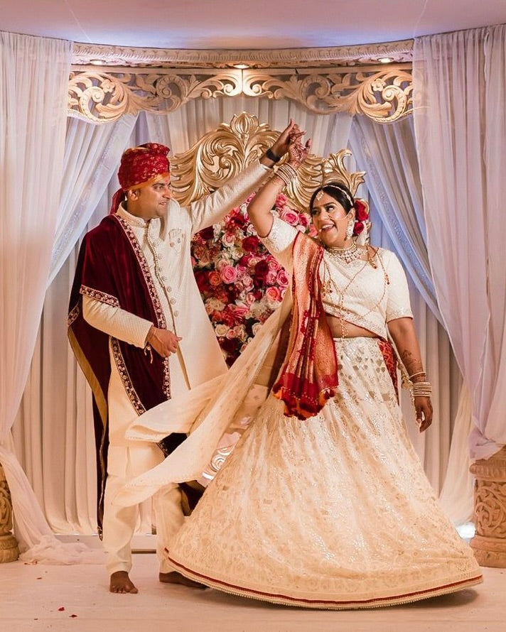 Sherni London White Chikankari Gotapati Bridal Lehenga with draped Red Saree. Real Indian bride mandap wedding