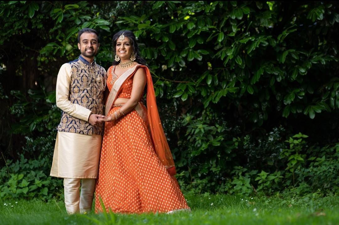 Sherni London Orange Bespoke Engagement Lehenga with gold borders and hand embroidery