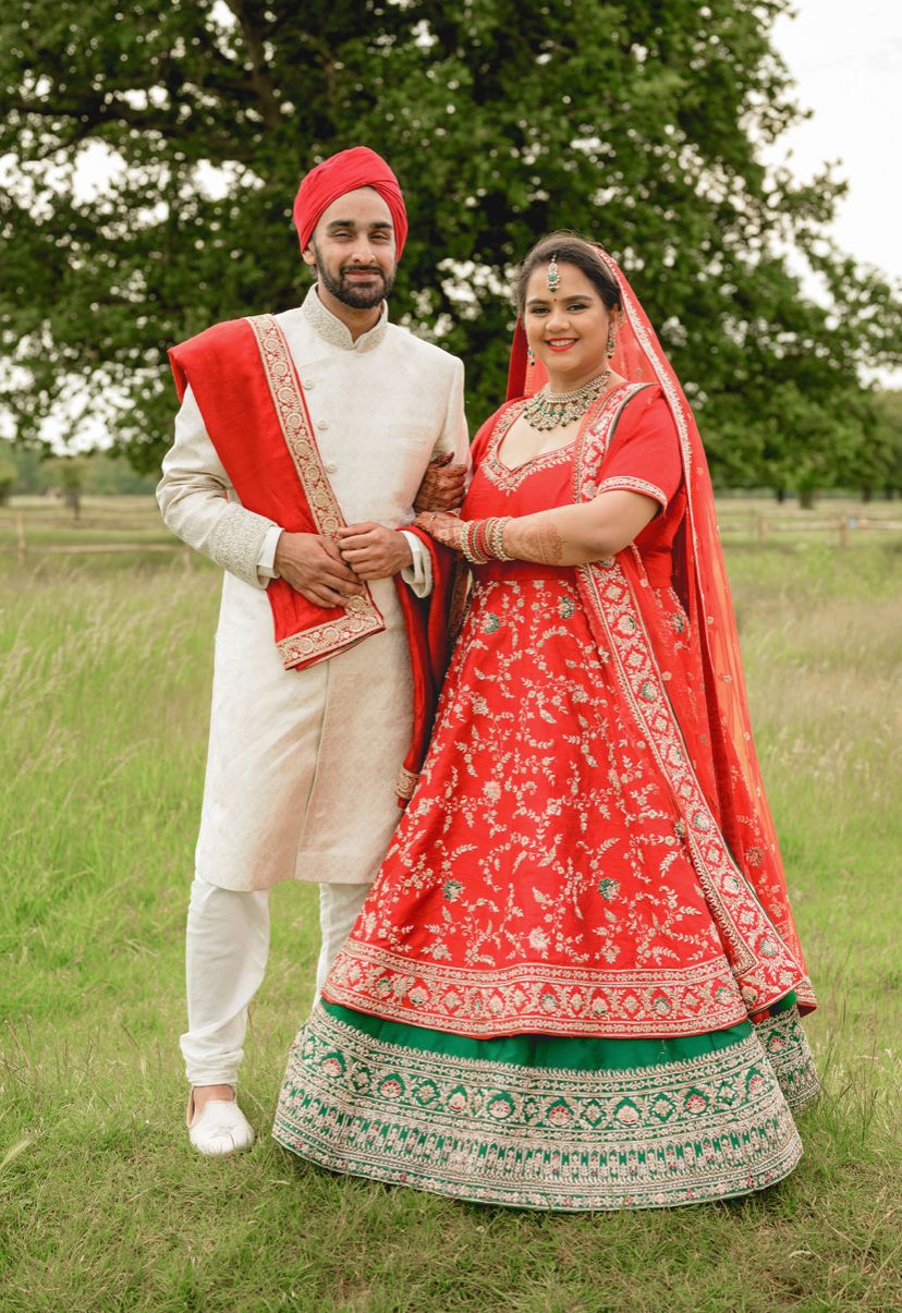Sherni London double layer red and green bridal lehenga with double dupatta